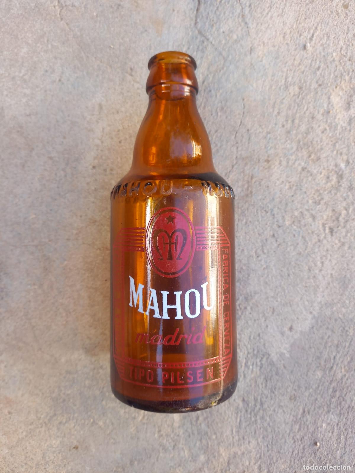 Coleccionismo de cervezas: BOTELLA CERVEZ *MAHOU* MADRID TIPO PILSEN, 33 CL SERIGRAF&Iacute;A ROJA Y LETRAS RELIEVE EN CUELLO