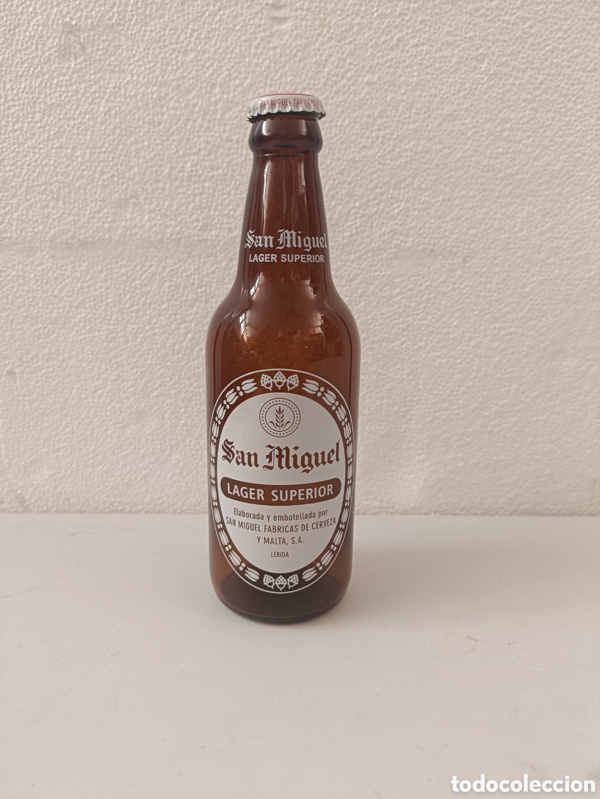 Coleccionismo de cervezas: Botella antigua de cerveza SAN MIGUEL Lager superior