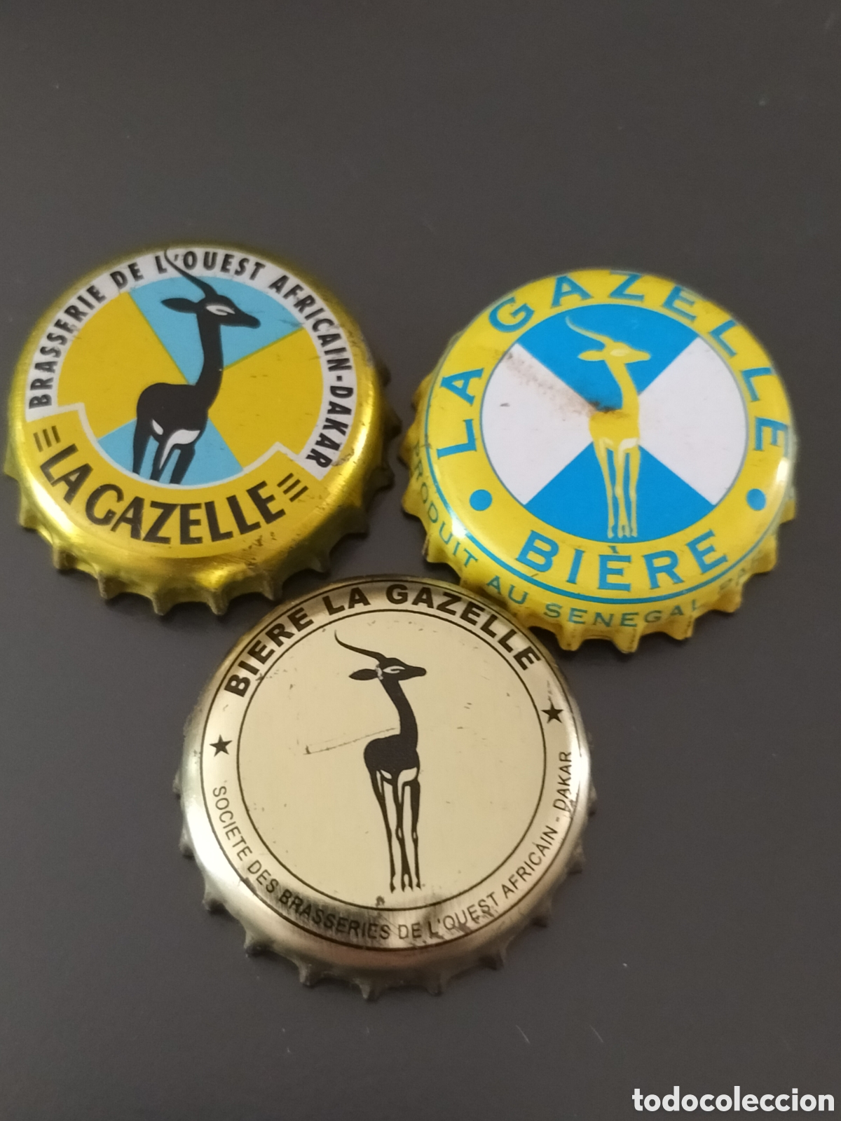 Coleccionismo de cervezas: LOTE 3 CHAPAS TAPON CORONA CERVEZA - SENEGAL