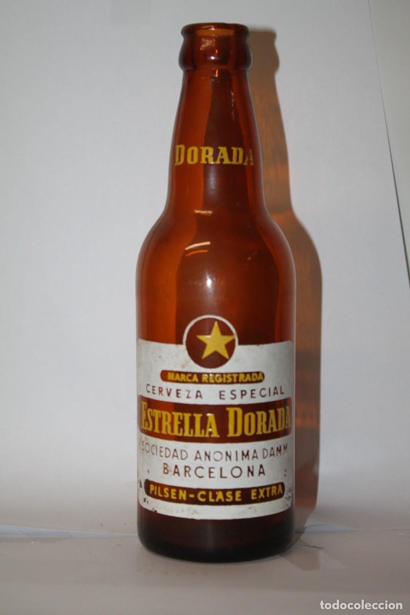 Coleccionismo de cervezas: ANTIGUA BOTELLA CERVEZA ESTRELLA DORADA 33 CL