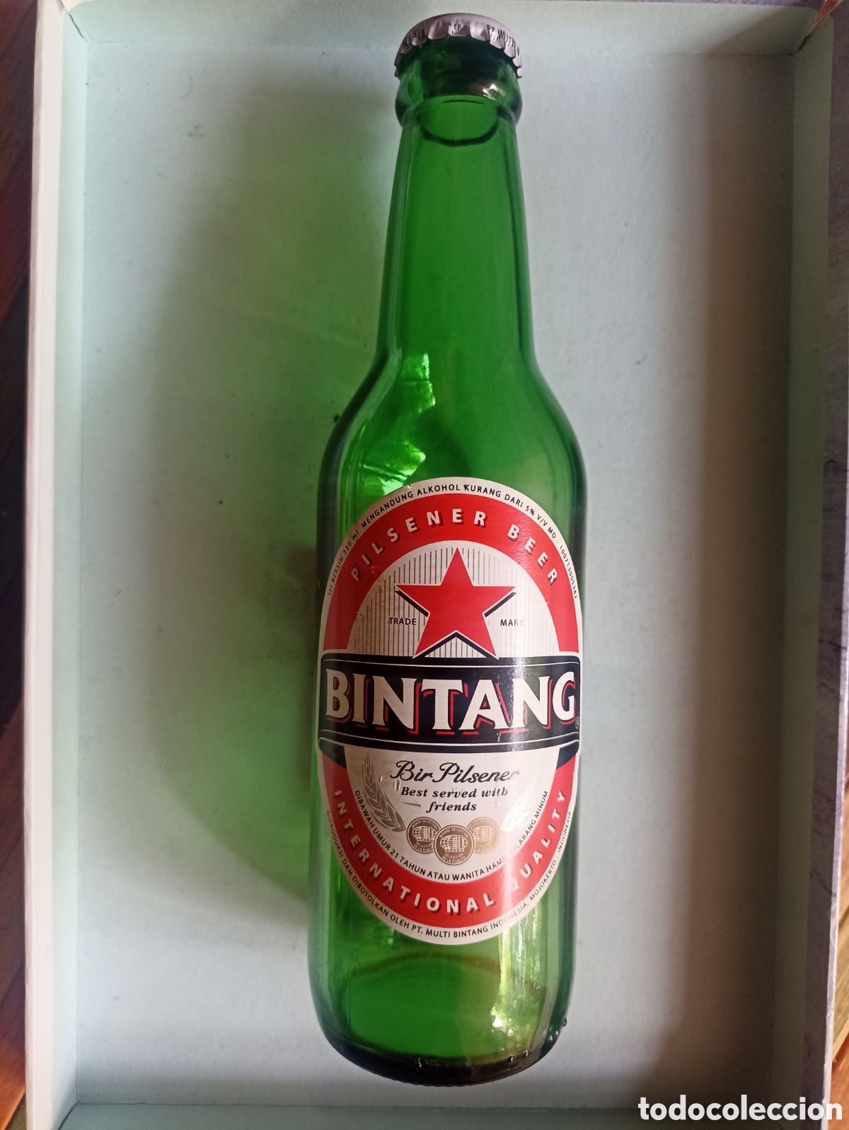Coleccionismo de cervezas: Botella cerveza Bintang Indonesia vac&iacute;a con chapa 300 ml
