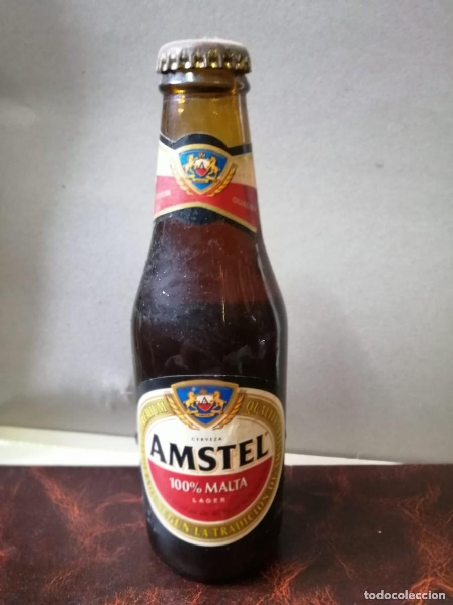 Coleccionismo de cervezas: BOTELLA DE CERVEZA (LLENA) AMSTEL - Foto 1