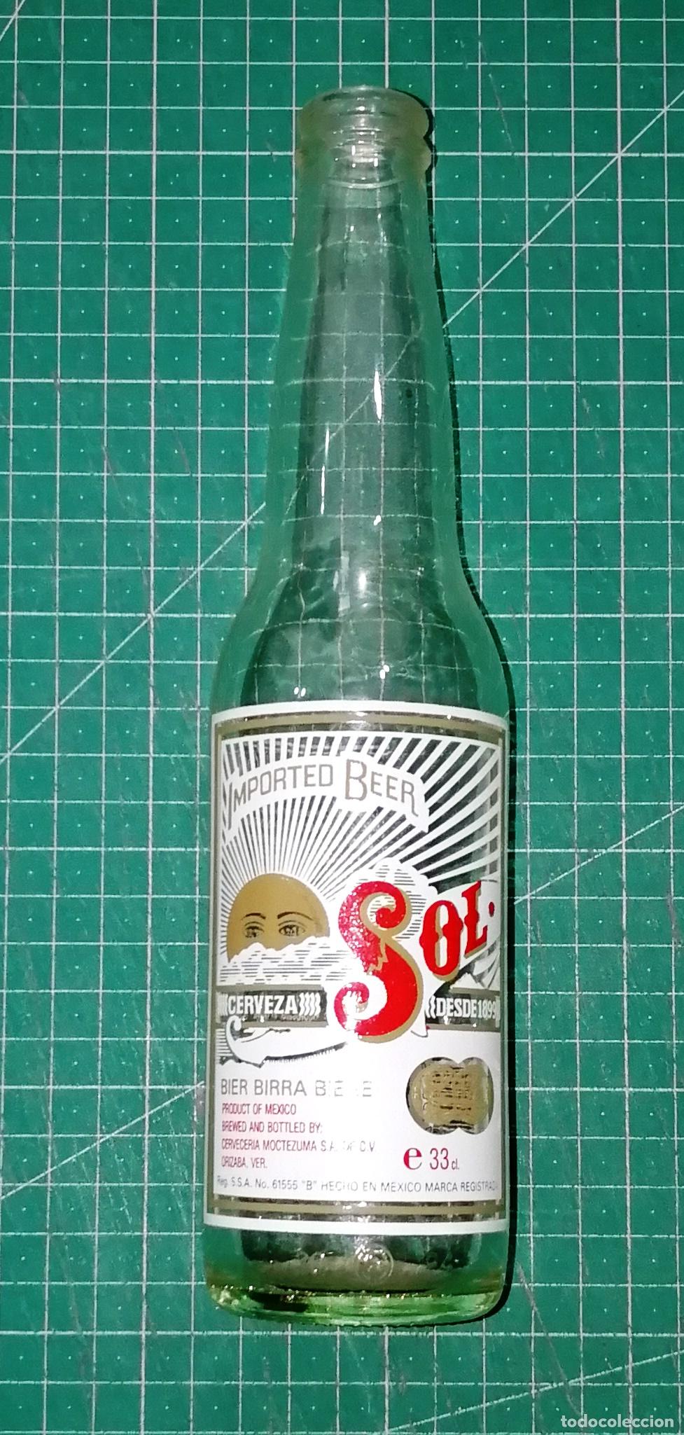 Coleccionismo de cervezas: BOTELLA CERVEZA. SOL. Serigrafiada. - M&eacute;xico, A&ntilde;os 90. - 33 cl. - Altura aprox. 24 cm