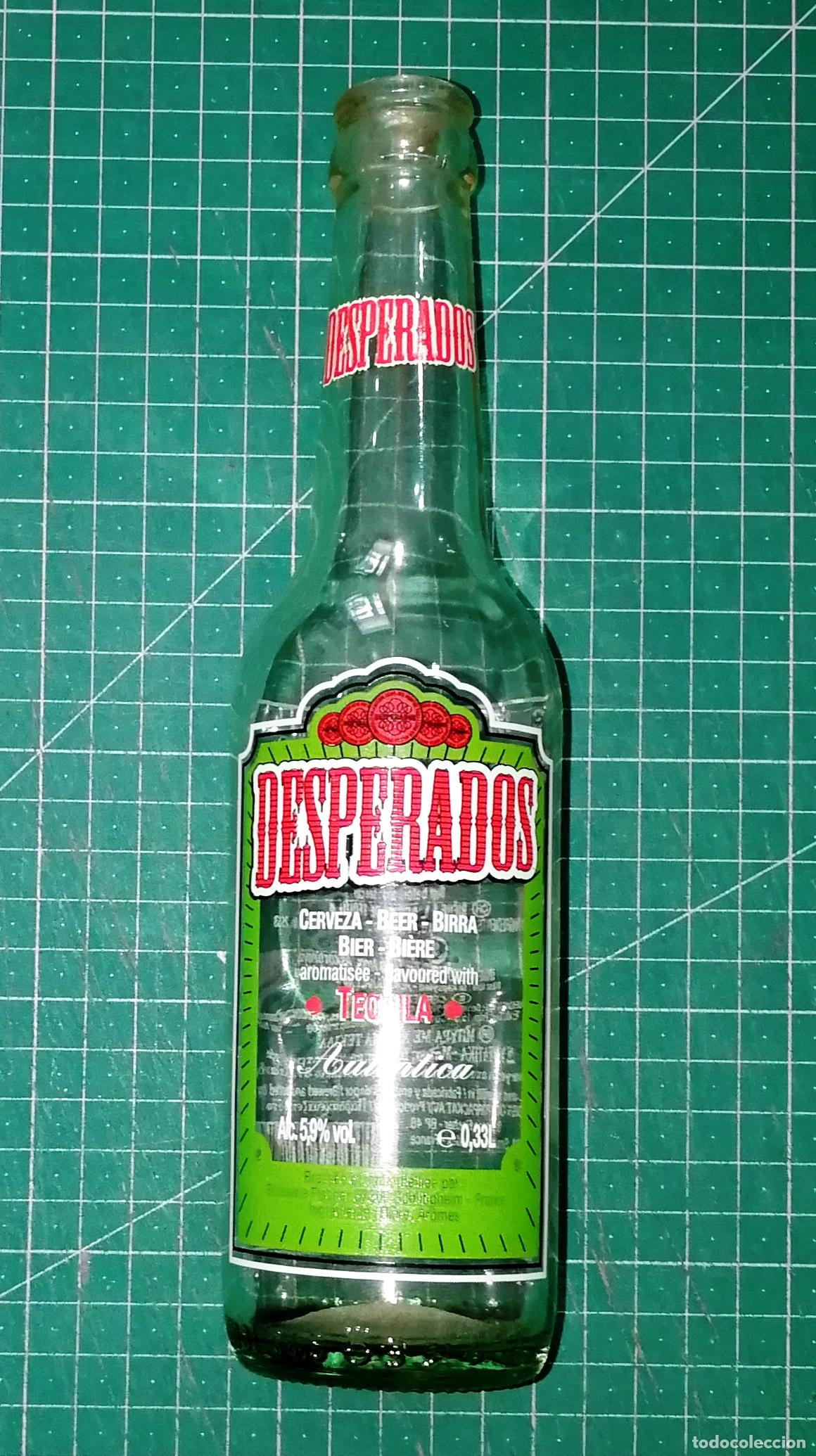 Coleccionismo de cervezas: BOTELLA CERVEZA. DESPERADOS. Con Tequila. Serigrafiada. - Francia, A&ntilde;os 90. - 33 cl. - Altura 24 cm