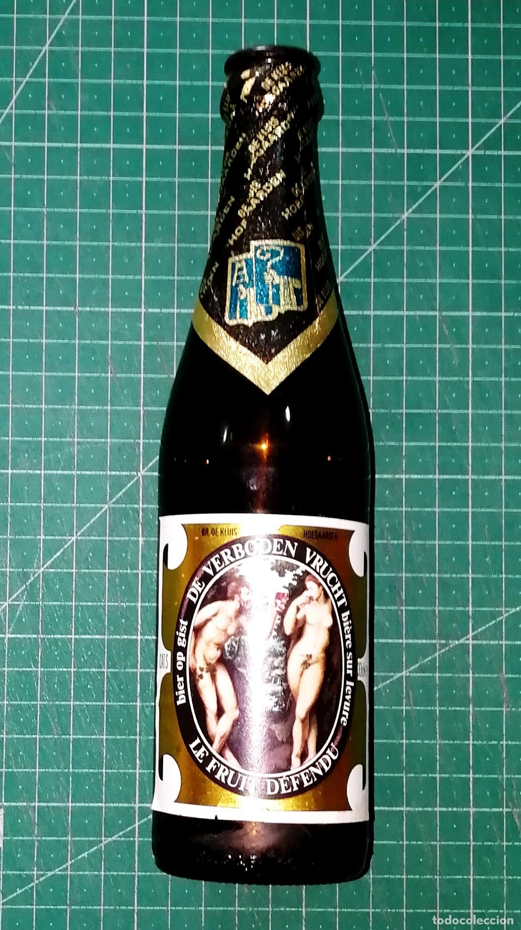 Coleccionismo de cervezas: BOTELLA CERVEZA. &lsquo;DE VERBODEN VRUCHT&rsquo; = &lsquo;LE FRUIT D&Eacute;FENDU&rsquo;. B&eacute;lgica, A&ntilde;os 90. - 33 cl.- Altura 23 cm