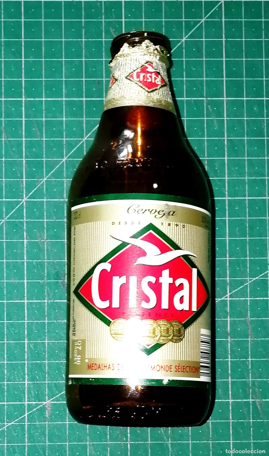 Coleccionismo de cervezas: BOTELLA CERVEZA. CRISTAL PILSENER. Portugal, A&ntilde;os 90. - 33 cl. - Altura aprox. 17 cm