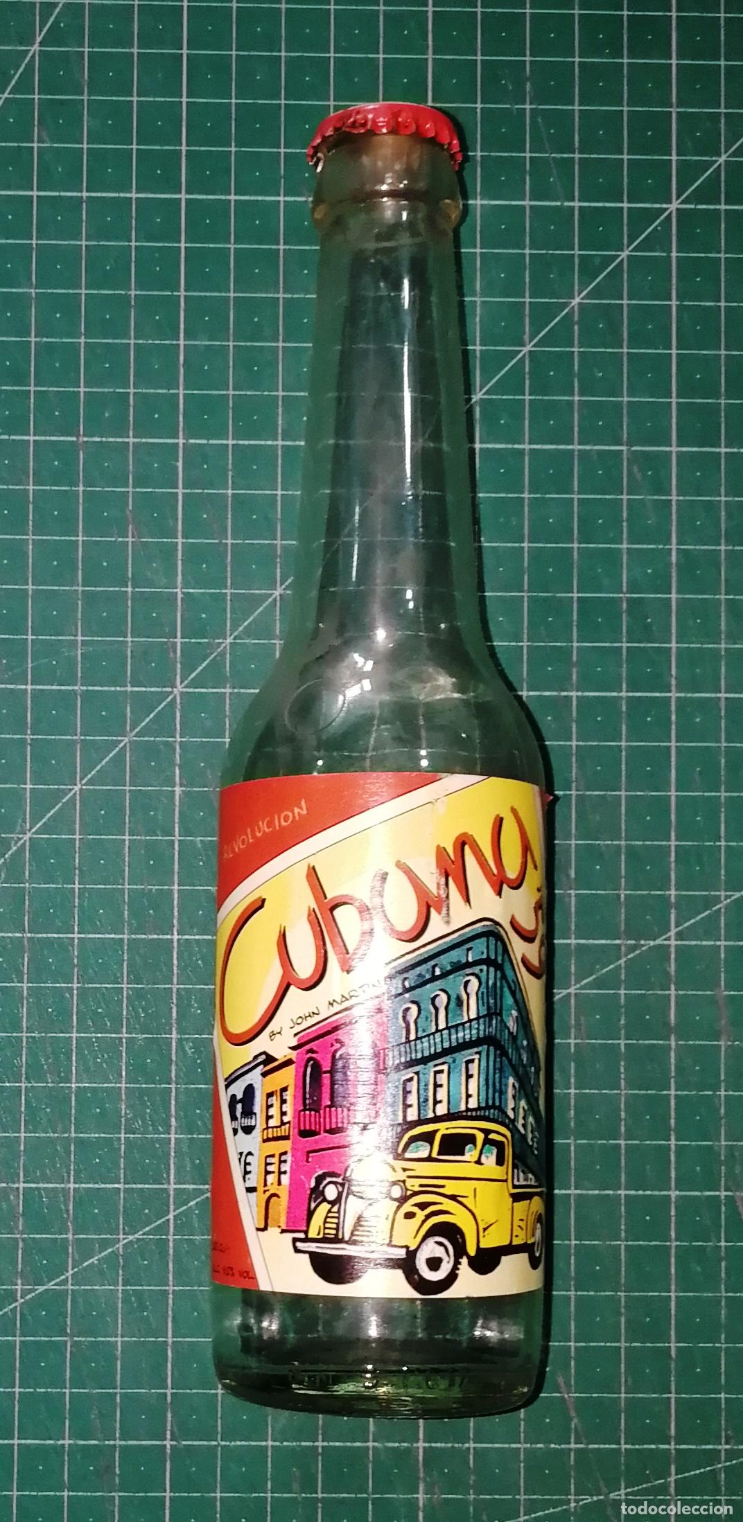 Coleccionismo de cervezas: BOTELLA CERVEZA. CUBANA 59. Con Ron. Con chapa. - B&eacute;lgica, A&ntilde;os 90. - 33 cl. - Altura aprox. 24 cm