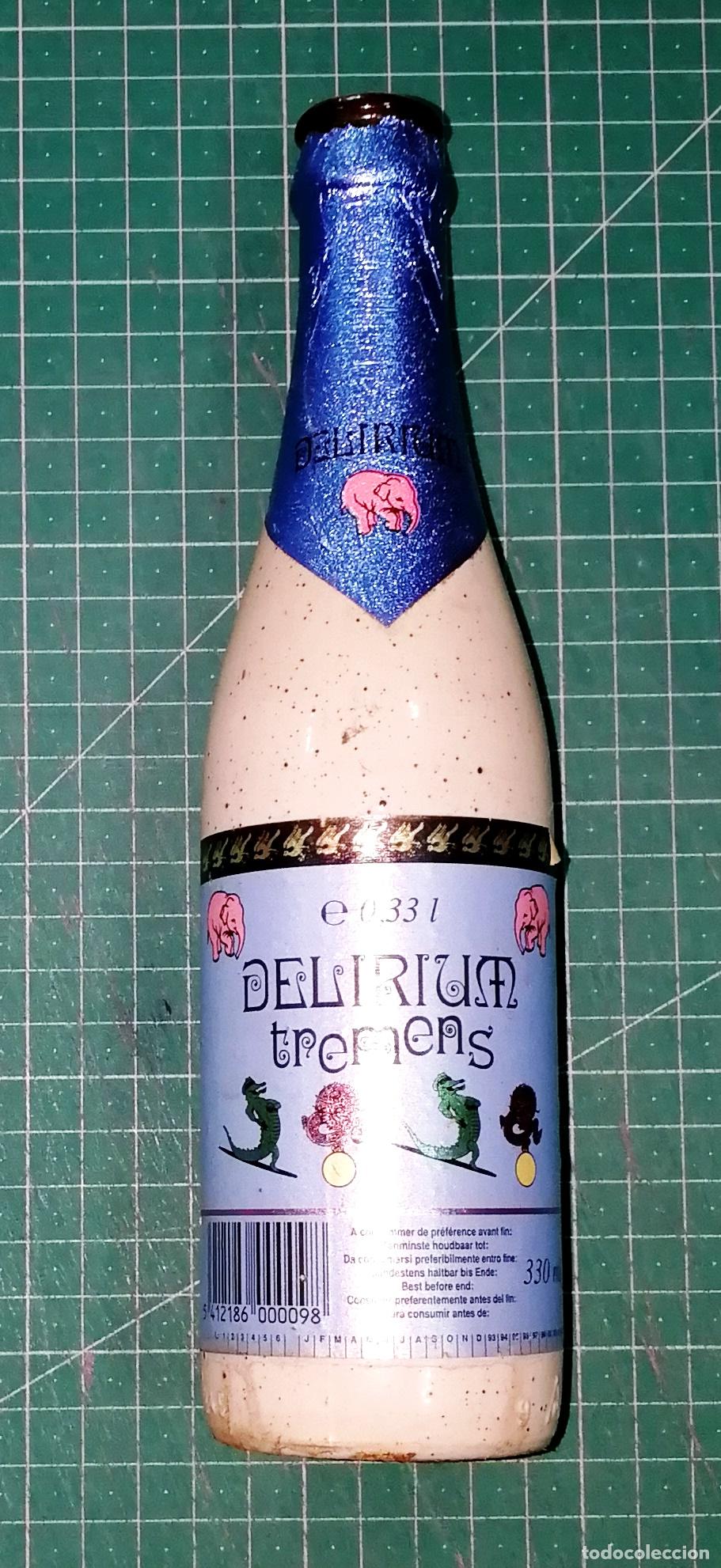 Coleccionismo de cervezas: BOTELLA CERVEZA. DELIRIUM TREMENS. - B&eacute;lgica, A&ntilde;os 90. - 33 cl. - Altura aprox. 23 cm