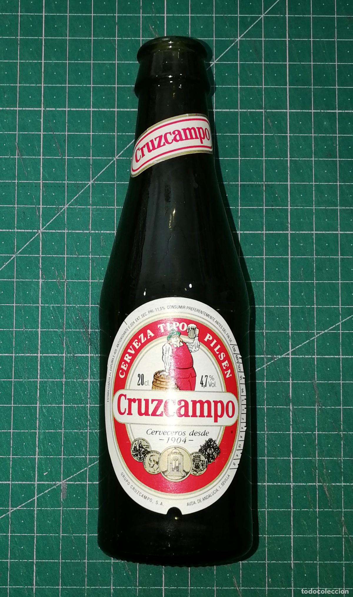 Coleccionismo de cervezas: BOTELLA CERVEZA.CRUZCAMPO [LA CRUZ DEL CAMPO]. Quinto, botell&iacute;n. - Espa&ntilde;a, A&ntilde;os 90. - 25 cl. - 18 cm