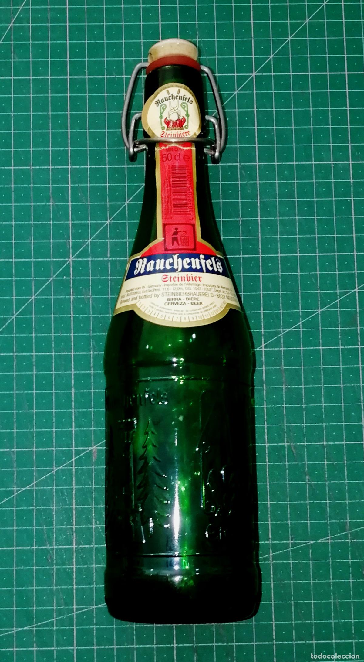 Coleccionismo de cervezas: BOTELLA CERVEZA. RAUCHENFELS STEINBIER. Con tap&oacute;n oscilante. logo grabado. - Alemania