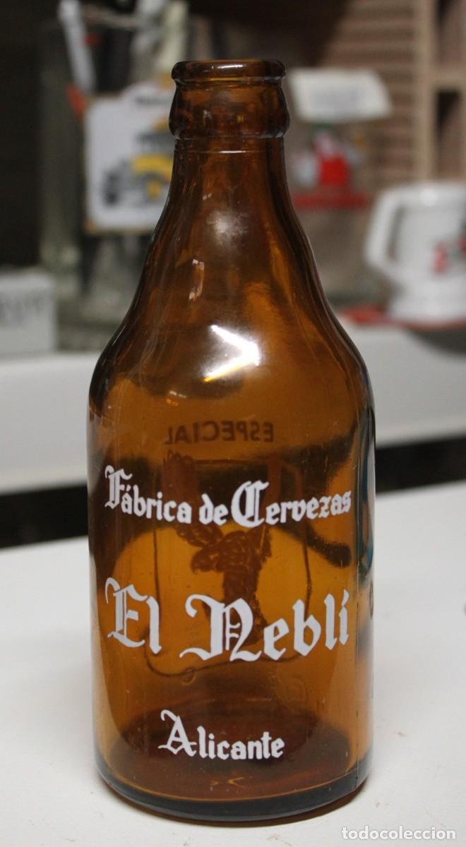 Coleccionismo de cervezas: ANTIGUA BOTELLA CERVEZA EL NEBLI 33 CL.