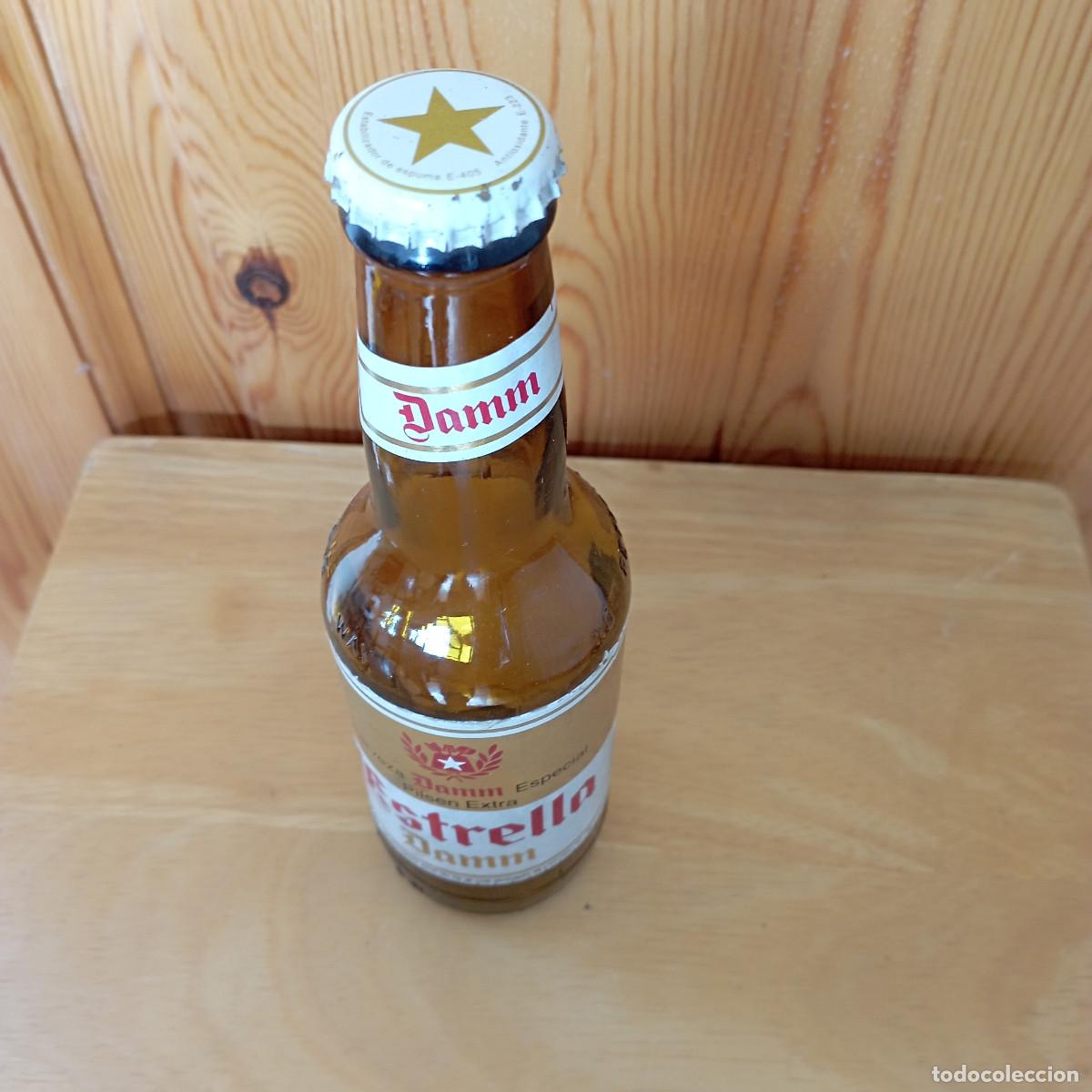 Coleccionismo de cervezas: Botella cerveza ESTRELLA DAMM ESPECIAL PILSEN EXTRA - vacia con chapa