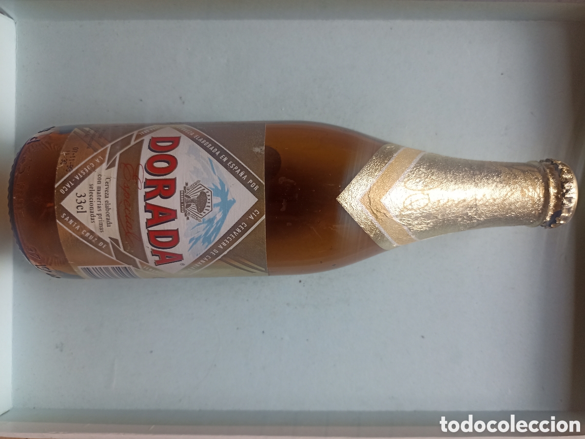Coleccionismo de cervezas: Botella cerveza Dorada Especial vac&iacute;a con chapa 330 ml