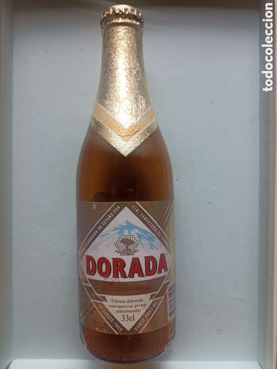 Coleccionismo de cervezas: Botella cerveza Dorada Especial Tenerife Canarias vac&iacute;a con chapa 330 ml