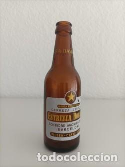 Coleccionismo de cervezas: Botella de cerveza Damm estrella dorada -64-