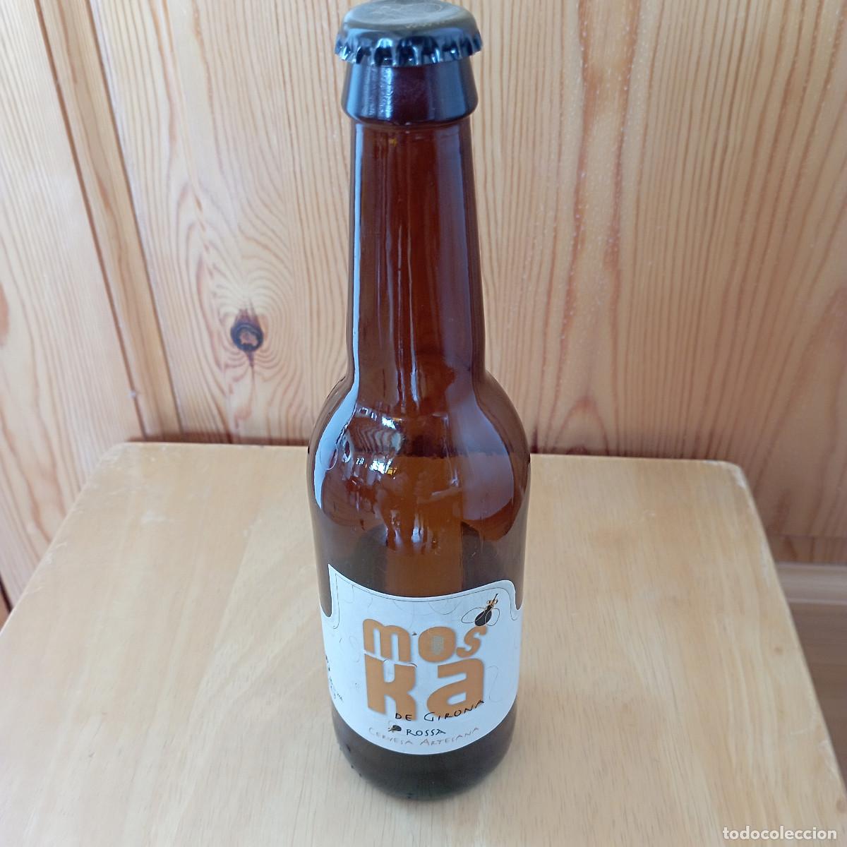 Coleccionismo de cervezas: botella cerveza MOSKA DE GIRONA ROSSA vacia con chapa