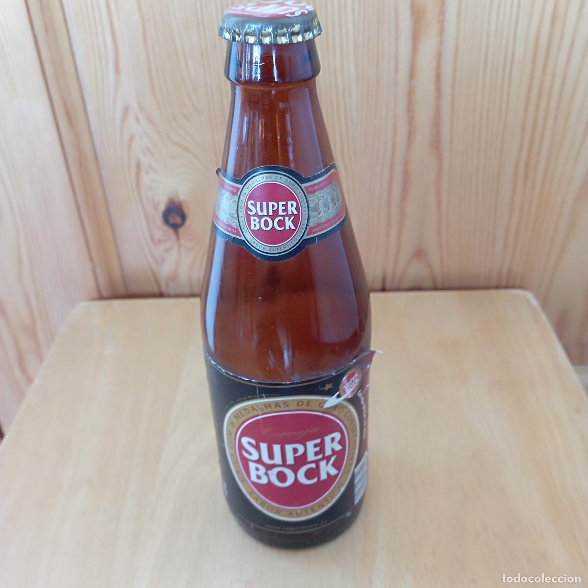 Coleccionismo de cervezas: botella cerveza SUPER BOCK vacia con chapa