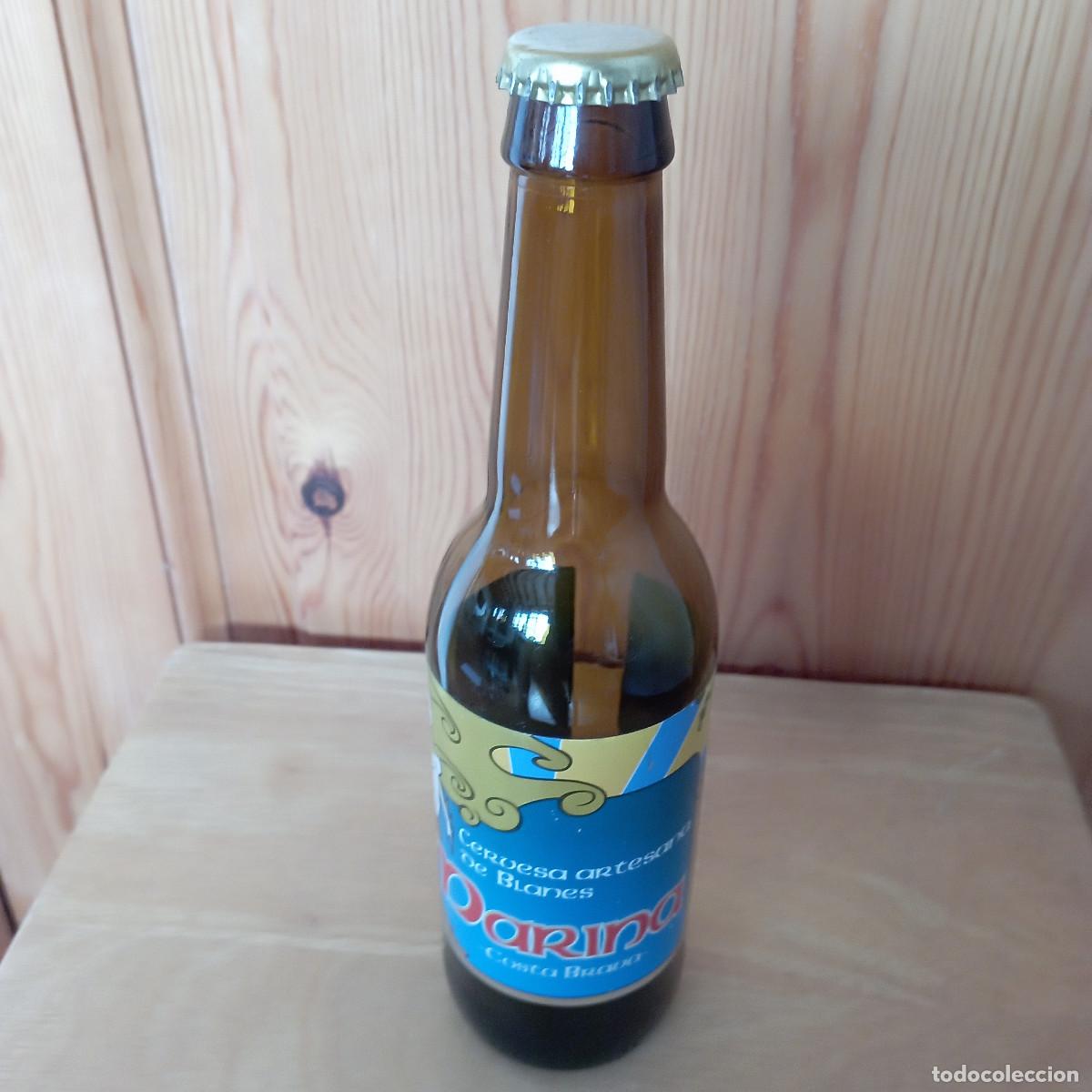 Coleccionismo de cervezas: botella cerveza MARINA COSTA BRAVA cervesa artesana de Blanes vacia con chapa