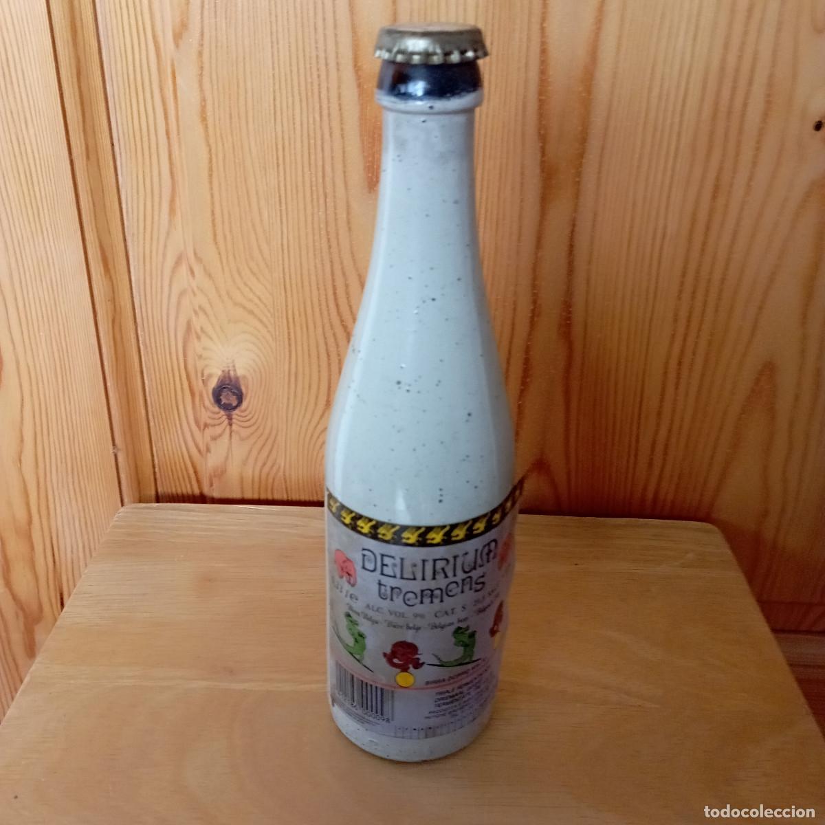 Coleccionismo de cervezas: botella cerveza DELIRIUM TREMENS vacia con chapa
