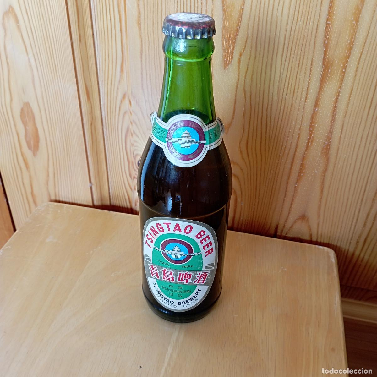 Coleccionismo de cervezas: botella cerveza TSINGTAO BEER llena