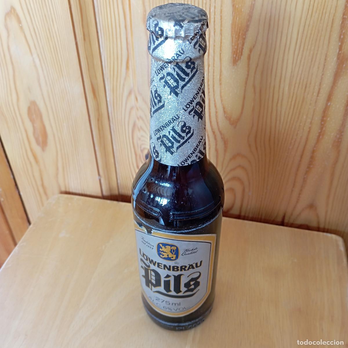 Coleccionismo de cervezas: botella cerveza LOWENBR&Auml;U PILS llena