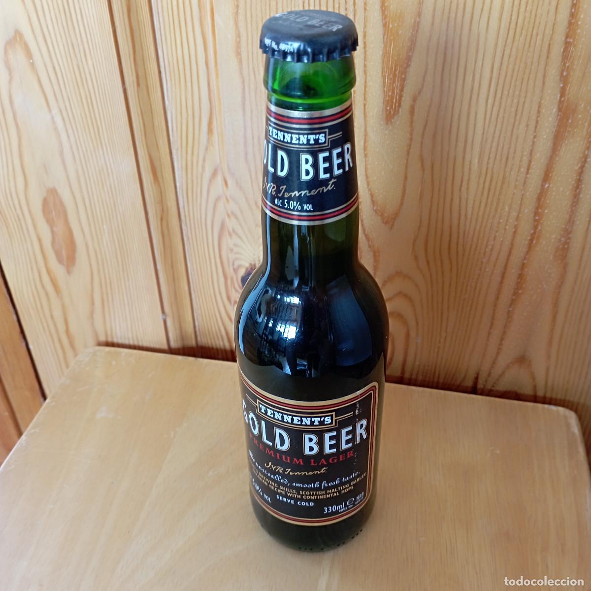Collectionnisme de bi&egrave;res: botella cerveza TENNENT'S GOLD BEER llena