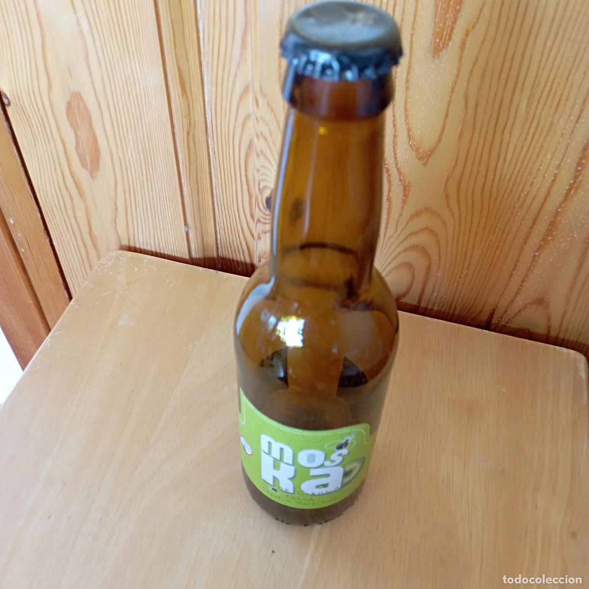Colecionismo de cervejas: botella cerveza MOSKA DE GIRONA POMA CERVESA ARTESANA vacia con chapa