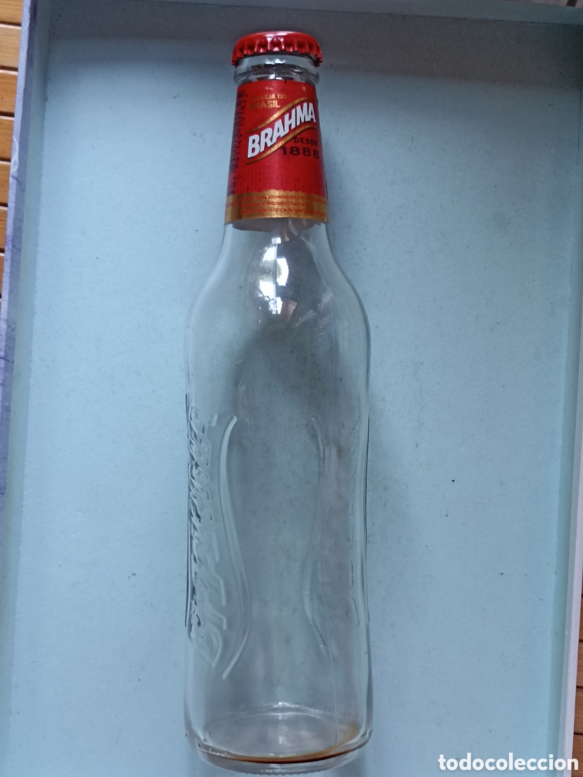Coleccionismo de cervezas: Botella cerveza Brahma Brasil vac&iacute;a con chapa 330 ml