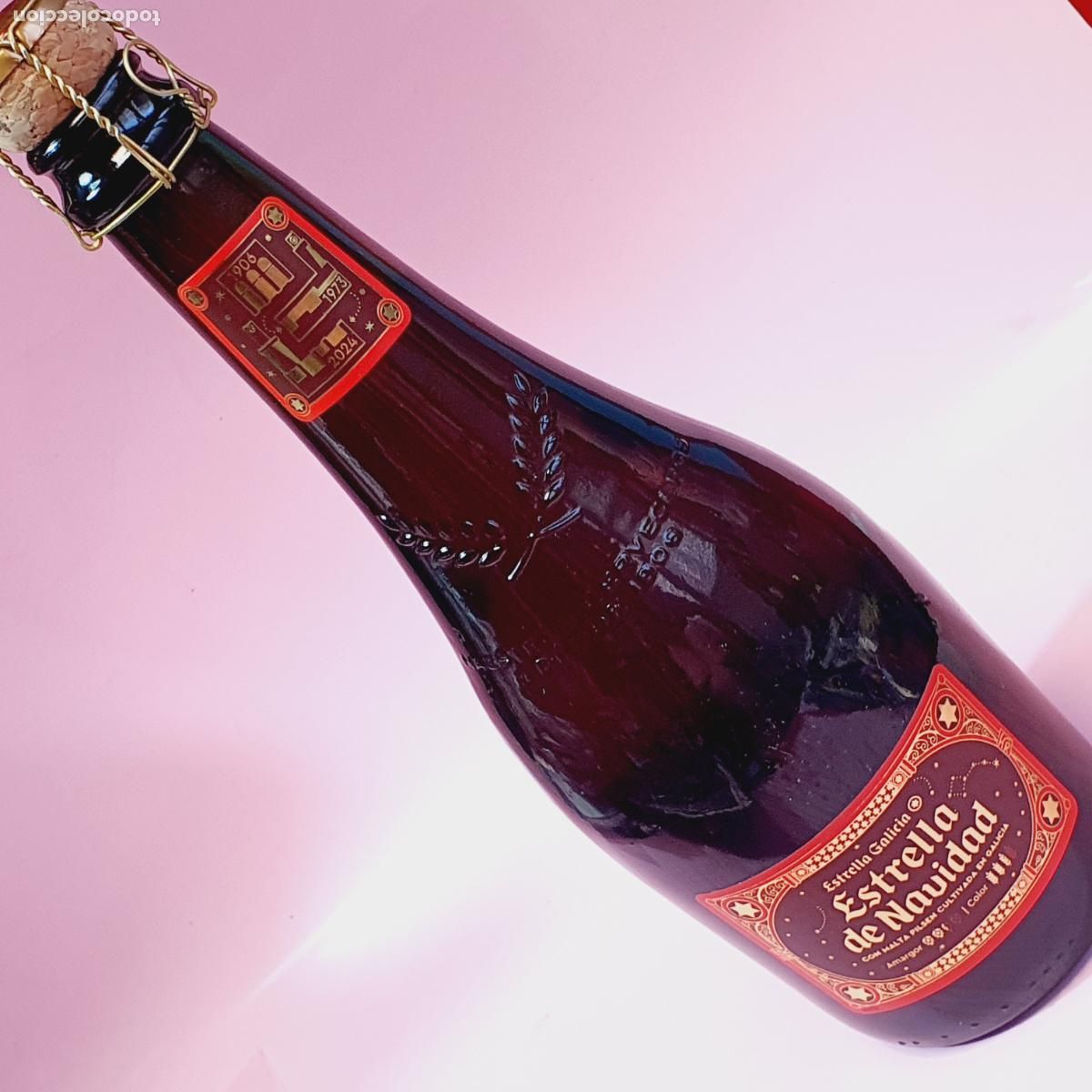 Coleccionismo de cervezas: BOTELLA-ESTRELLA DE NAVIDAD-ETIQUETA ROJA-2024-CAD.2025-COMO NUEVA-COLECCIONISTAS.