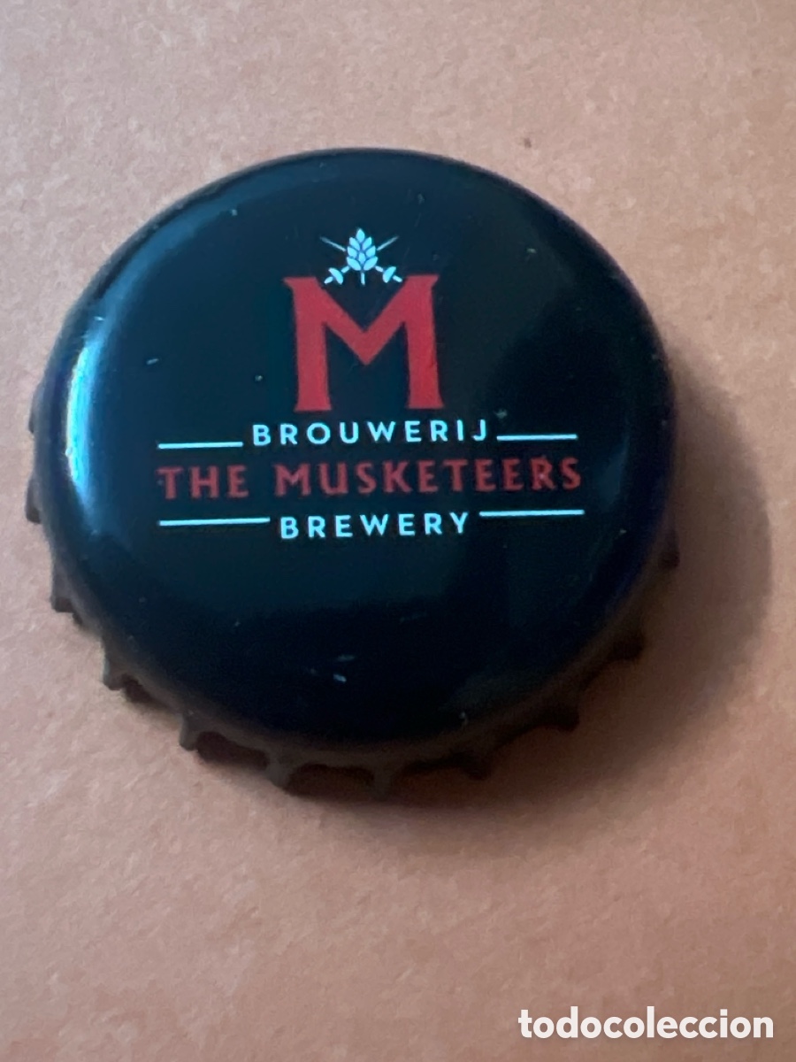 Coleccionismo de cervezas: T4/X102/N1. TAPON CORONA CAPSULA CHAPA CERVEZA THE MUSKETEERS (B&Eacute;LGICA)