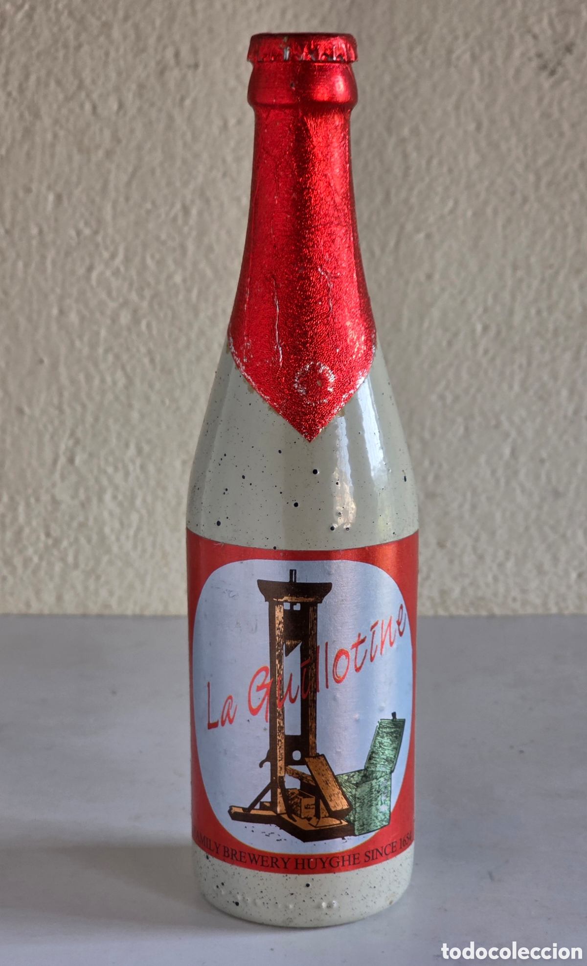 Coleccionismo de cervezas: Botella Cerveza Belga Le Guillotine Triple Fermentaci&oacute;n Cer&aacute;mica Precintada Belgian Beer Guillotina