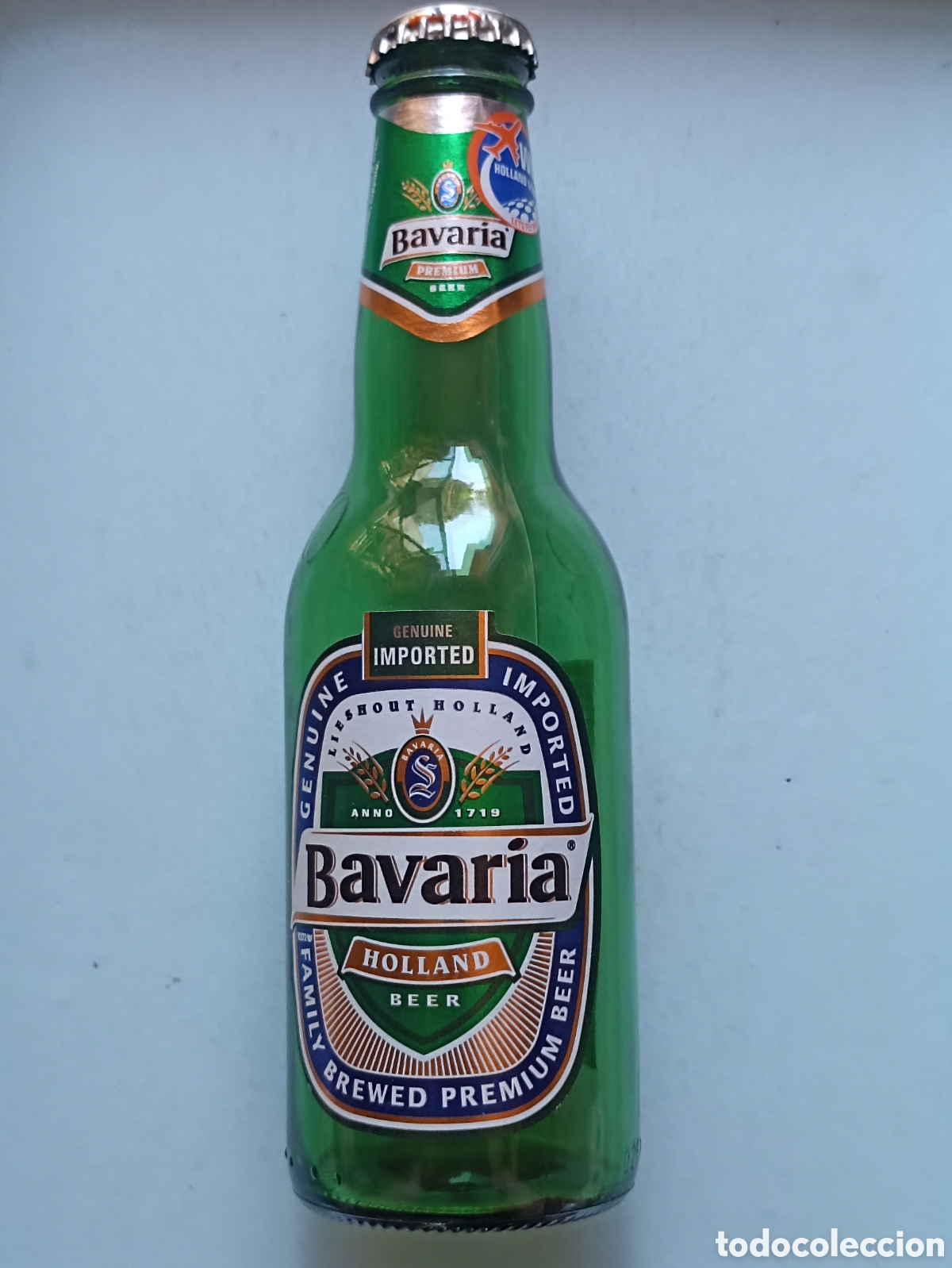 Coleccionismo de cervezas: Botella cerveza Bavaria Win Holland Trips vac&iacute;a con chapa 250 ml