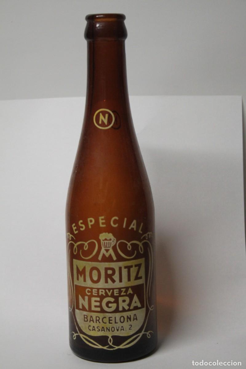 Coleccionismo de cervezas: ANTIGUA BOTELLA CERVEZA MORITZ NEGRA 33 CL