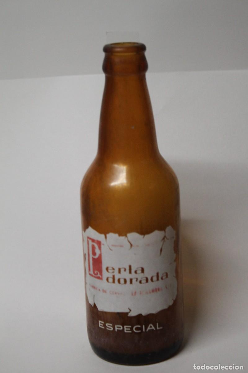 Coleccionismo de cervezas: RARA BOTELLA CERVEZA PERLA DORADA 20 CL.