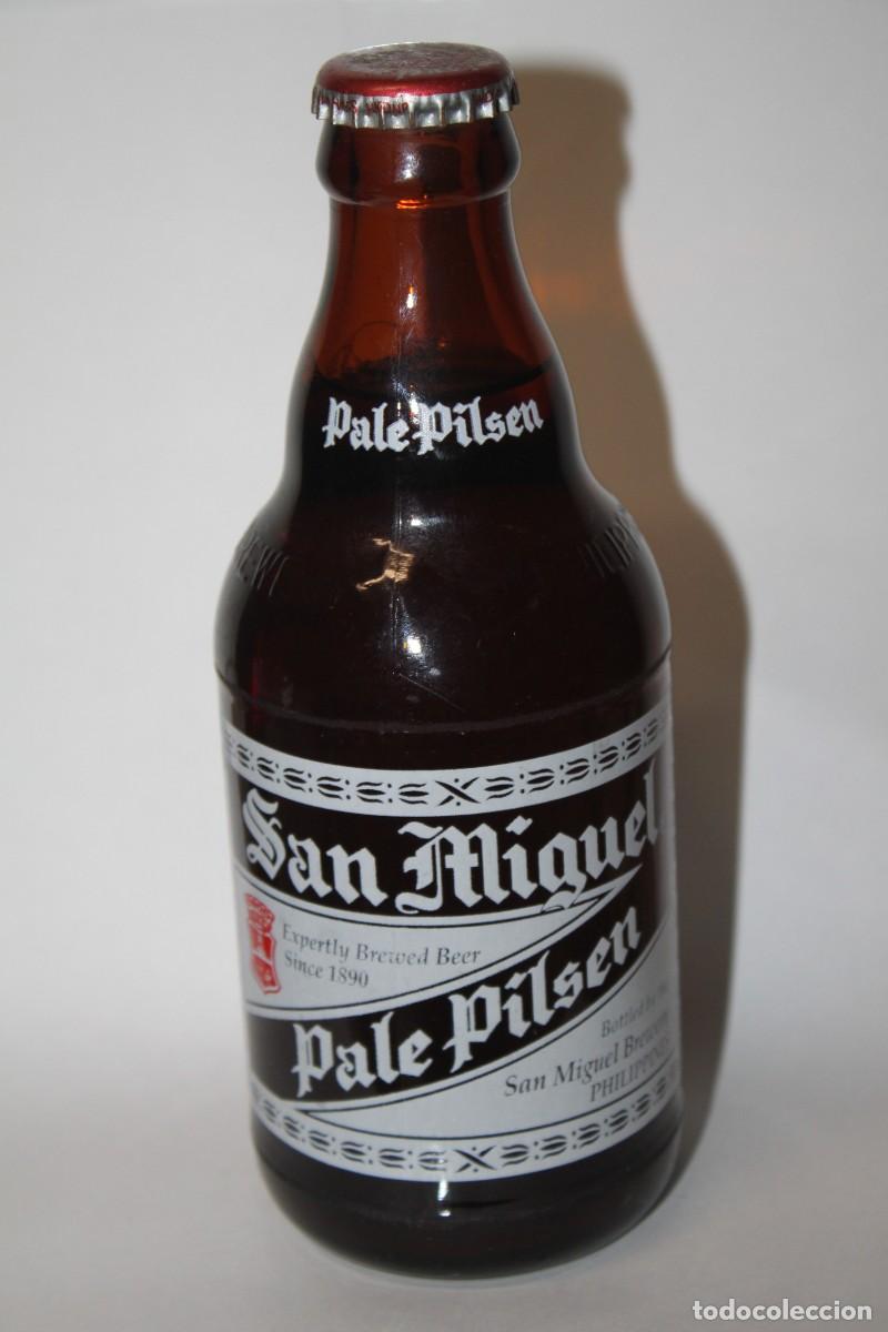 Coleccionismo de cervezas: PRECIOSA BOTELLA CERVEZA SAN MIGUEL FILIPINAS 33 CL. LLENA