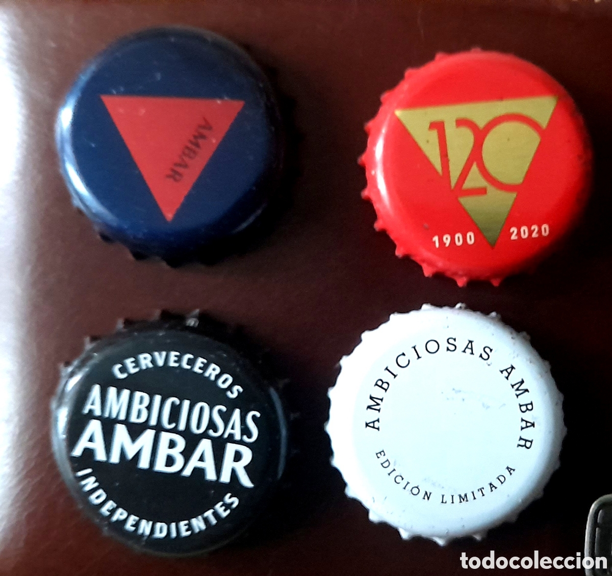 Coleccionismo de cervezas: Chapas de cerveza ambar ambiciosa