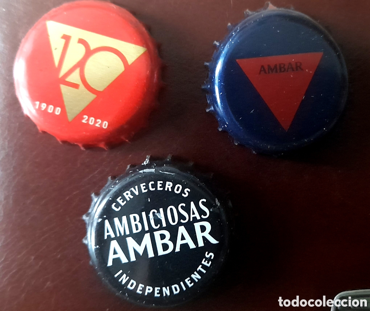 Coleccionismo de cervezas: Chapas de cerveza ambar ambiciosa
