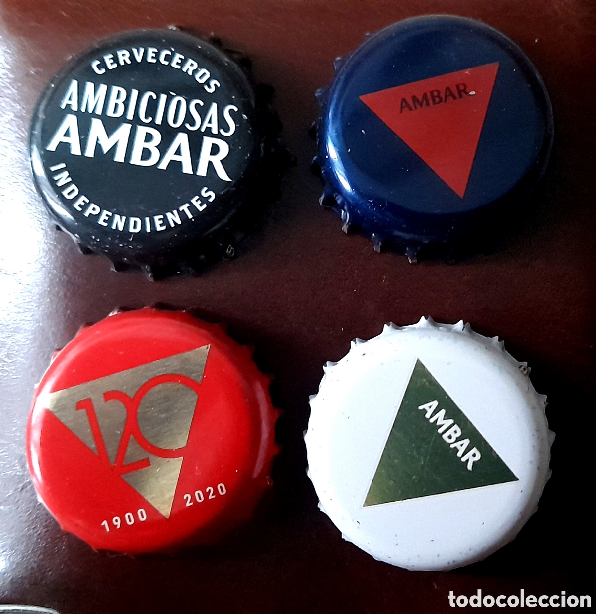 Coleccionismo de cervezas: Chapas de cerveza ambar ambiciosa
