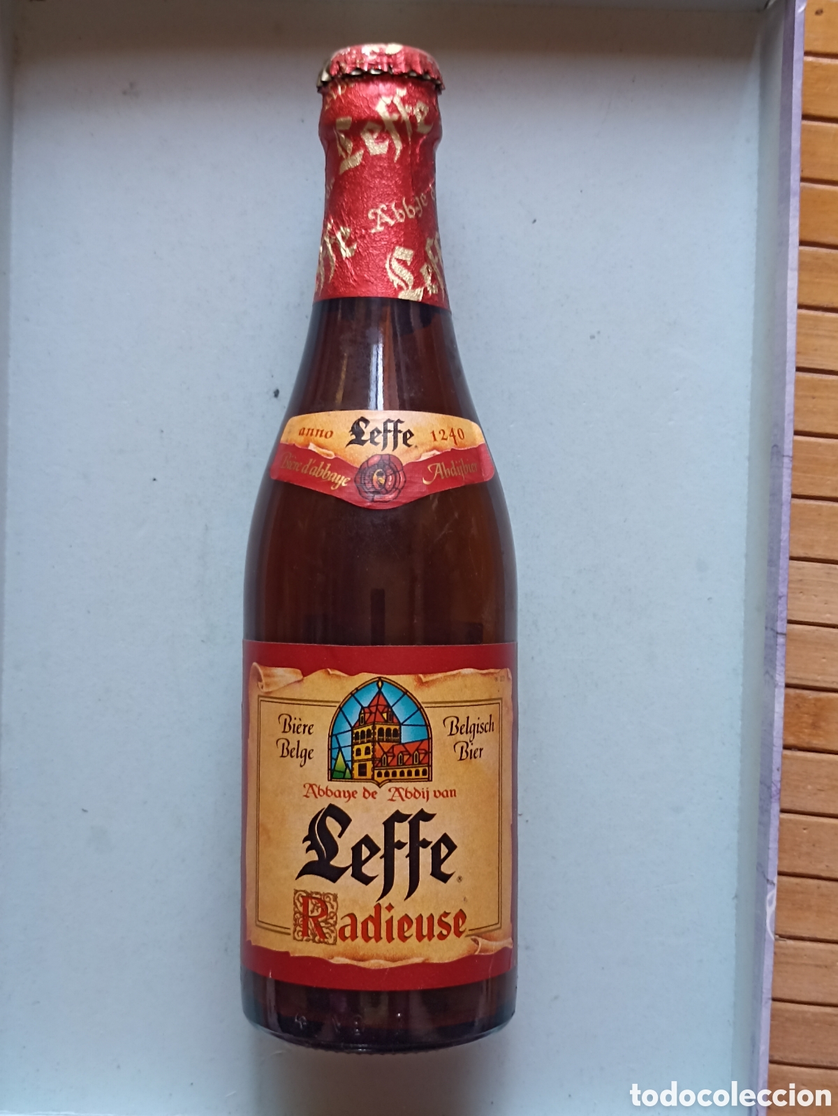 Coleccionismo de cervezas: Botella cerveza Leffe vac&iacute;a con chapa 330 ml