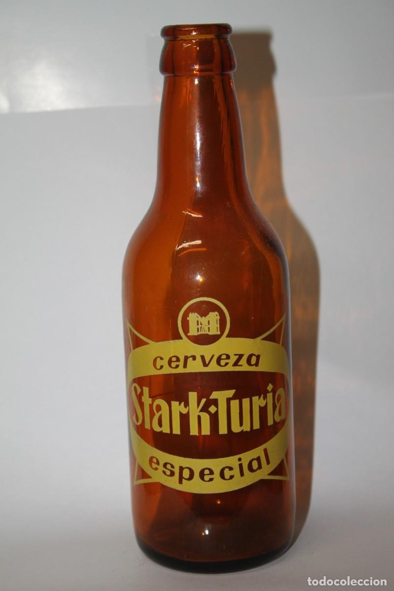 Coleccionismo de cervezas: ANTIGUA BOTELLA CERVEZA STARK TURIA 33 CL.