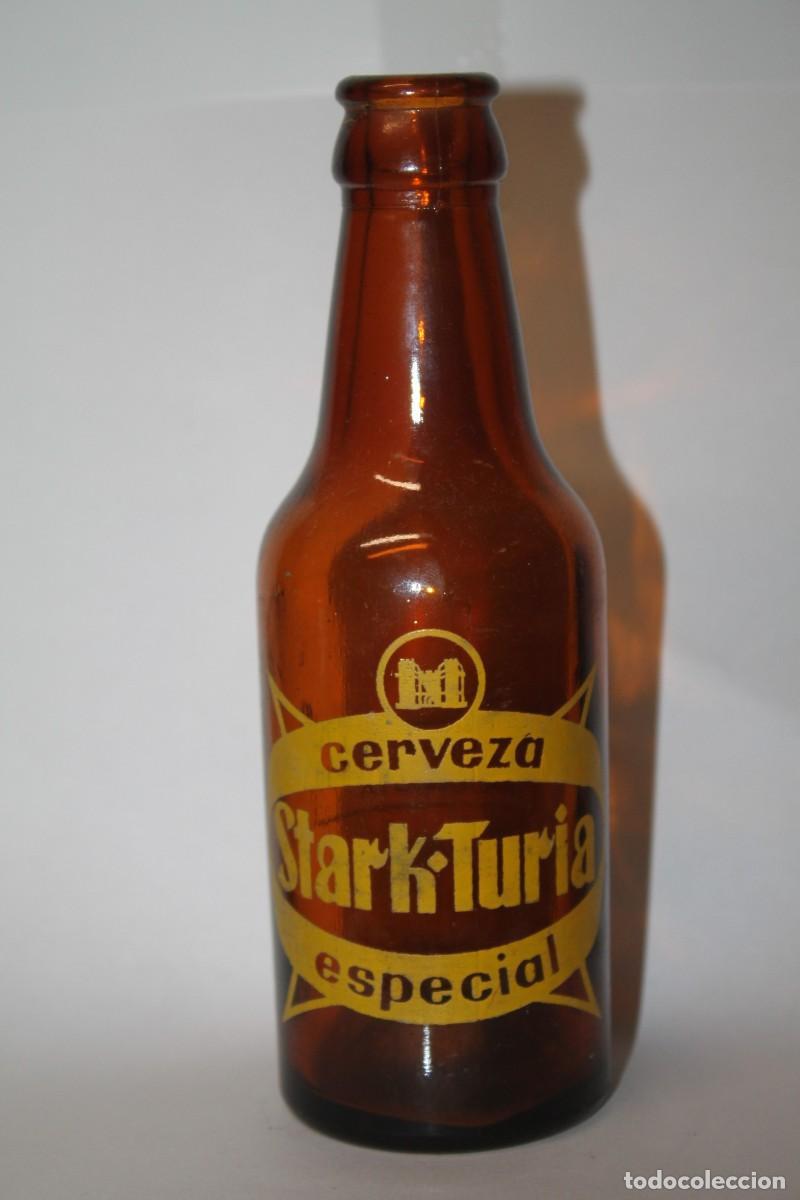 Coleccionismo de cervezas: ANTIGUA BOTELLA CERVEZA STARK TURIA 20 CL.