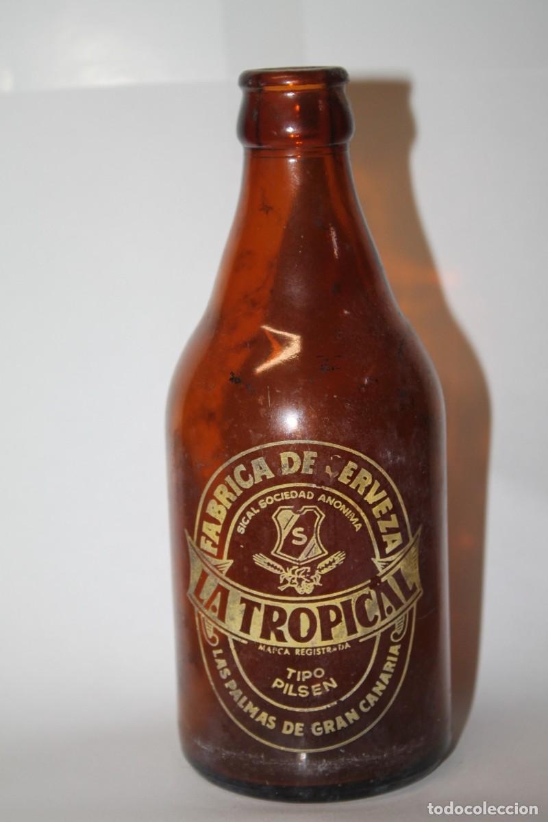 Coleccionismo de cervezas: BOTELLA CERVEZA LA TROPICAL 33 CL.