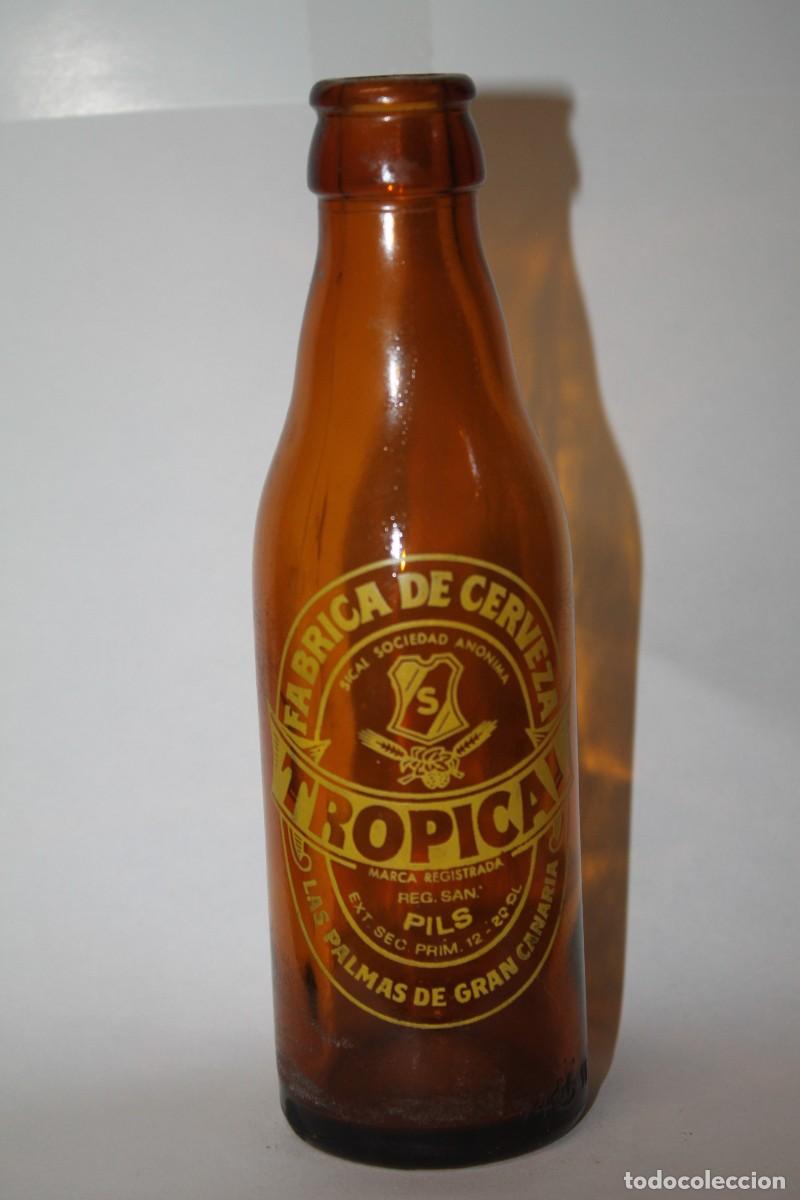 Coleccionismo de cervezas: ANTIGUA BOTELLA CERVEZA TROPICAL 20 CL.