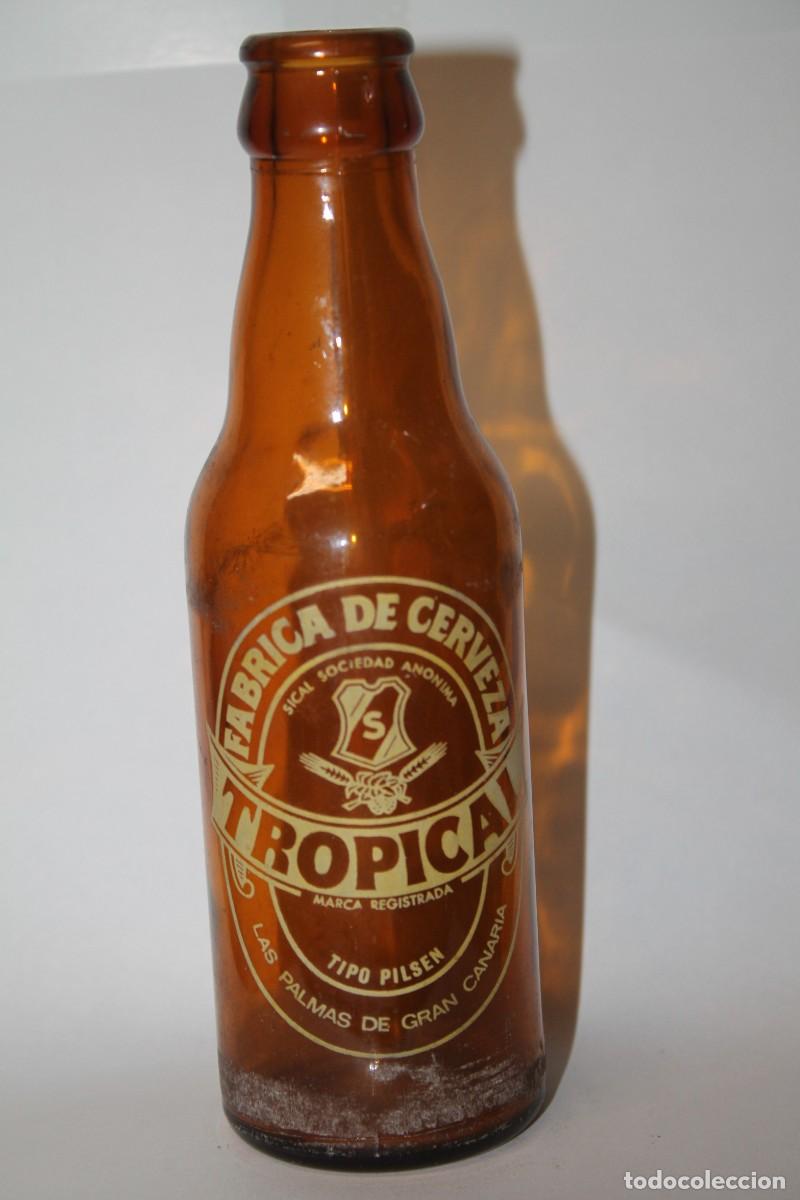 Coleccionismo de cervezas: BOTELLIN CERVEZA TROPICAL 20 CL.