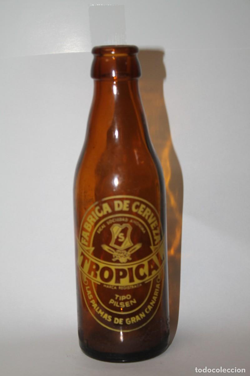Coleccionismo de cervezas: BOTELLIN CERVEZA TROPICAL 20 CL.