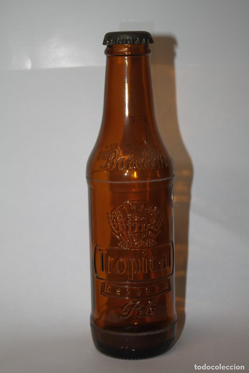 Coleccionismo de cervezas: BOTELLIN CERVEZA TROPICAL 20 CL VACIA