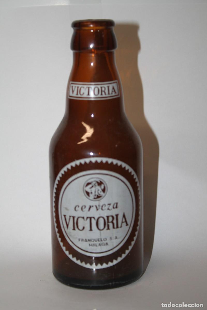 Coleccionismo de cervezas: ANTIGUO BOTELLIN CERVEZA VICTORIA 20 CL.