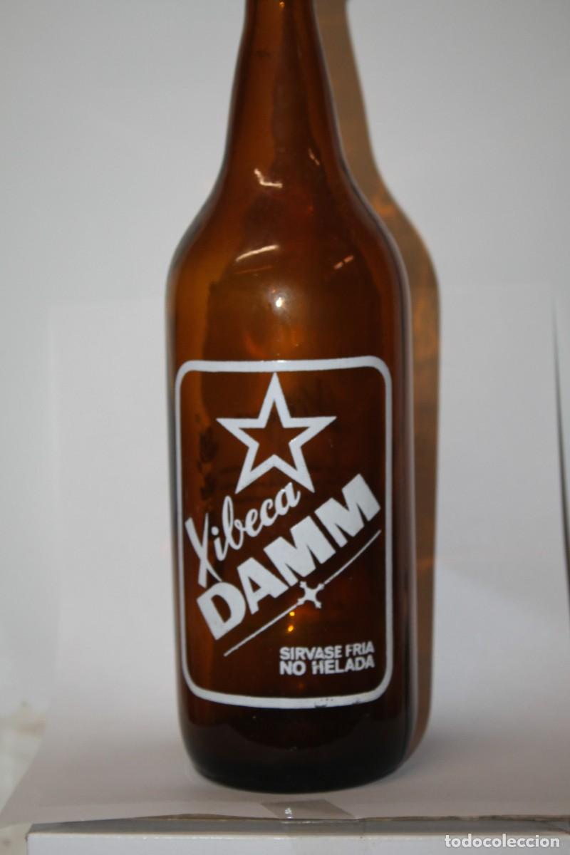 Coleccionismo de cervezas: ANTIGUA BOTELLA CERVEZA XIBECA LITRO, HOMBROS BAJOS