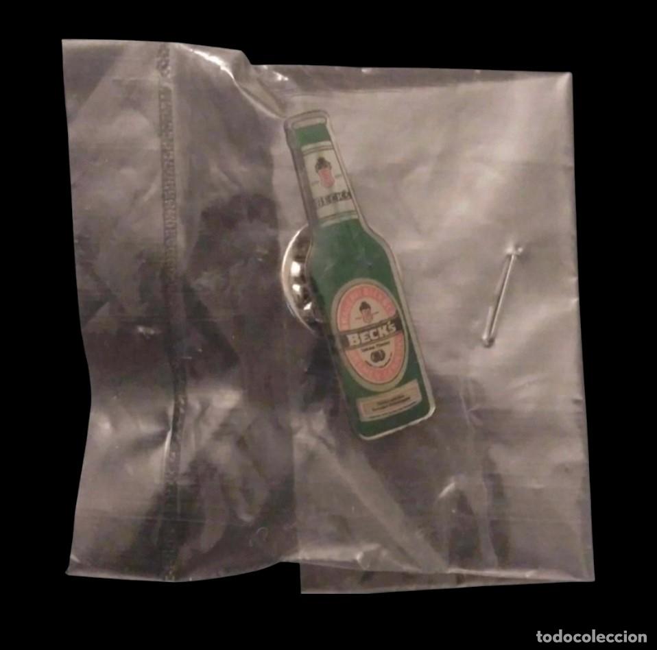 Coleccionismo de cervezas: PIN CERVEZA BECKS TOTALMENTE NUEVO - EN SU BOLSITA ORIGINAL.