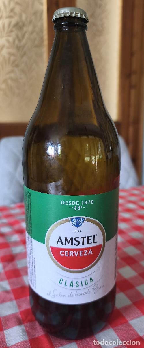 Coleccionismo de cervezas: BOTELLA VAC&Iacute;A CON ETIQUETAS y CHAPA TAPON CORONA CERVEZA - AMSTEL CL&Aacute;SICA